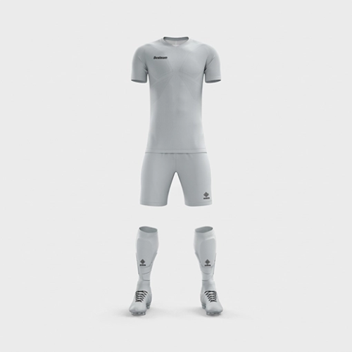 The official Silver Studs FC 'Clasico' academy football kit, featuring the light grey short-sleeved jersey, shorts, and matching socks with boots against a clean, light background.