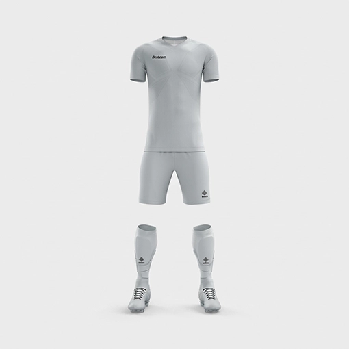 The official Silver Studs FC 'Clasico' academy football kit, featuring the light grey short-sleeved jersey, shorts, and matching socks with boots against a clean, light background.