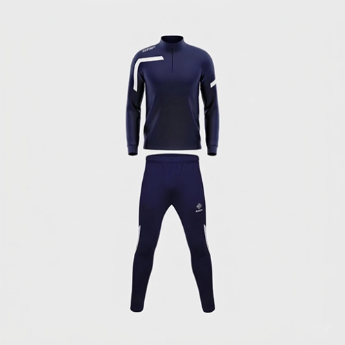 Official Silver Studs FC navy training tracksuit featuring a 1/4 zip top and matching tapered pants for academy players.