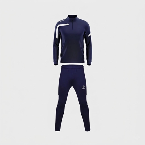 Official Silver Studs FC navy training tracksuit featuring a 1/4 zip top and matching tapered pants for academy players.